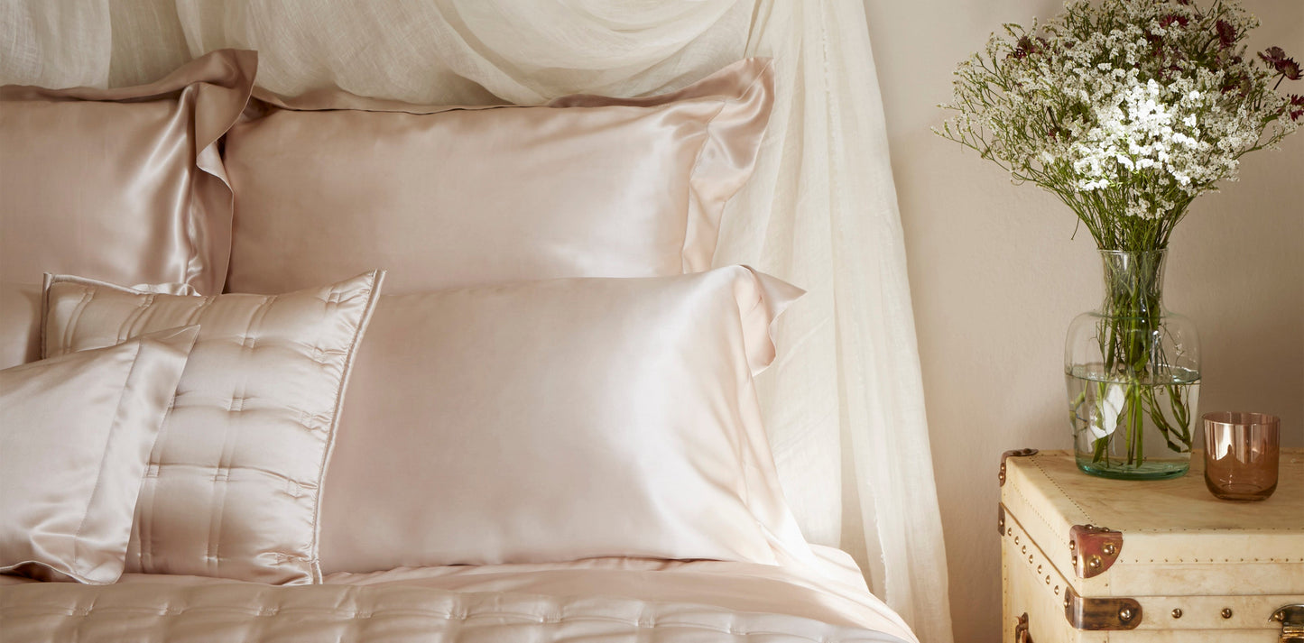 Silk fitted sheet in a blush pink color
