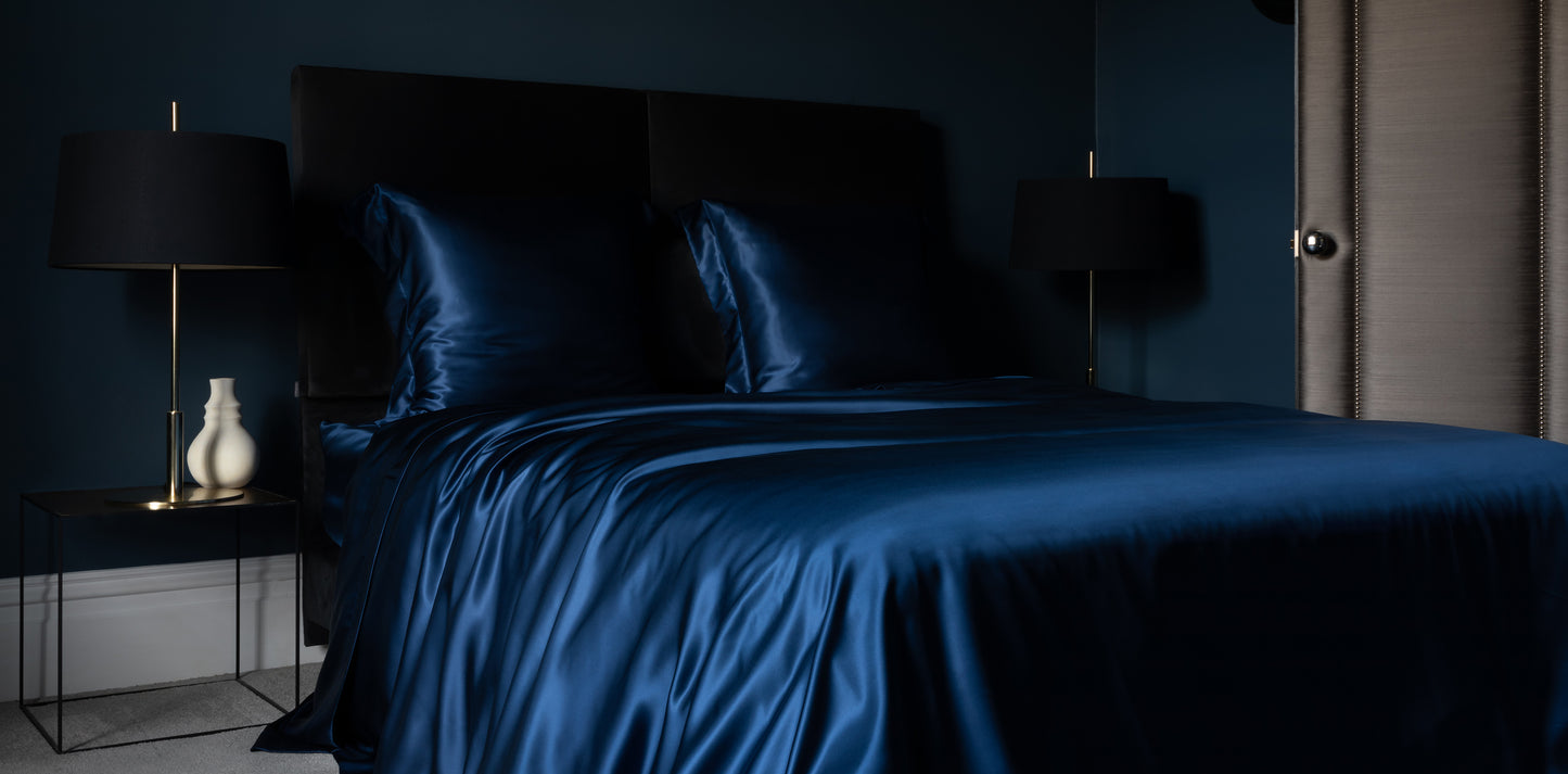 Navy silk duvet cover with decorative top stitching