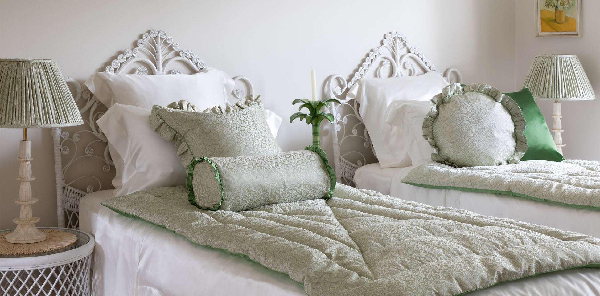 Coral and green fern patterned silk bolster cushion